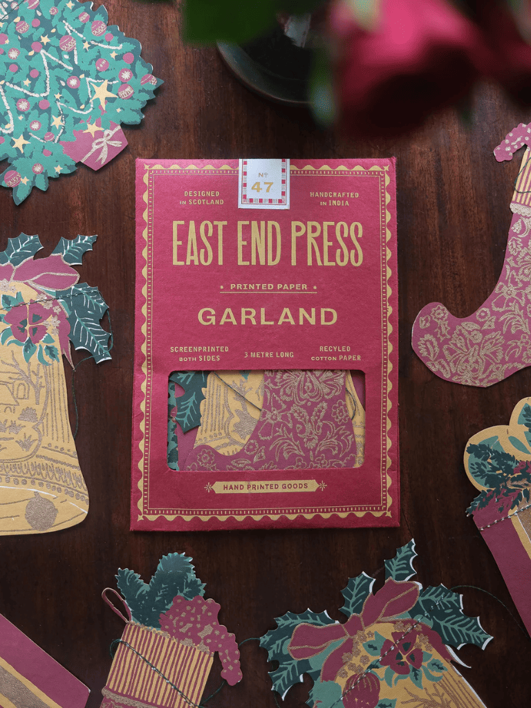 Guirlande en papier décorative East End Press aux motifs illustrés divers